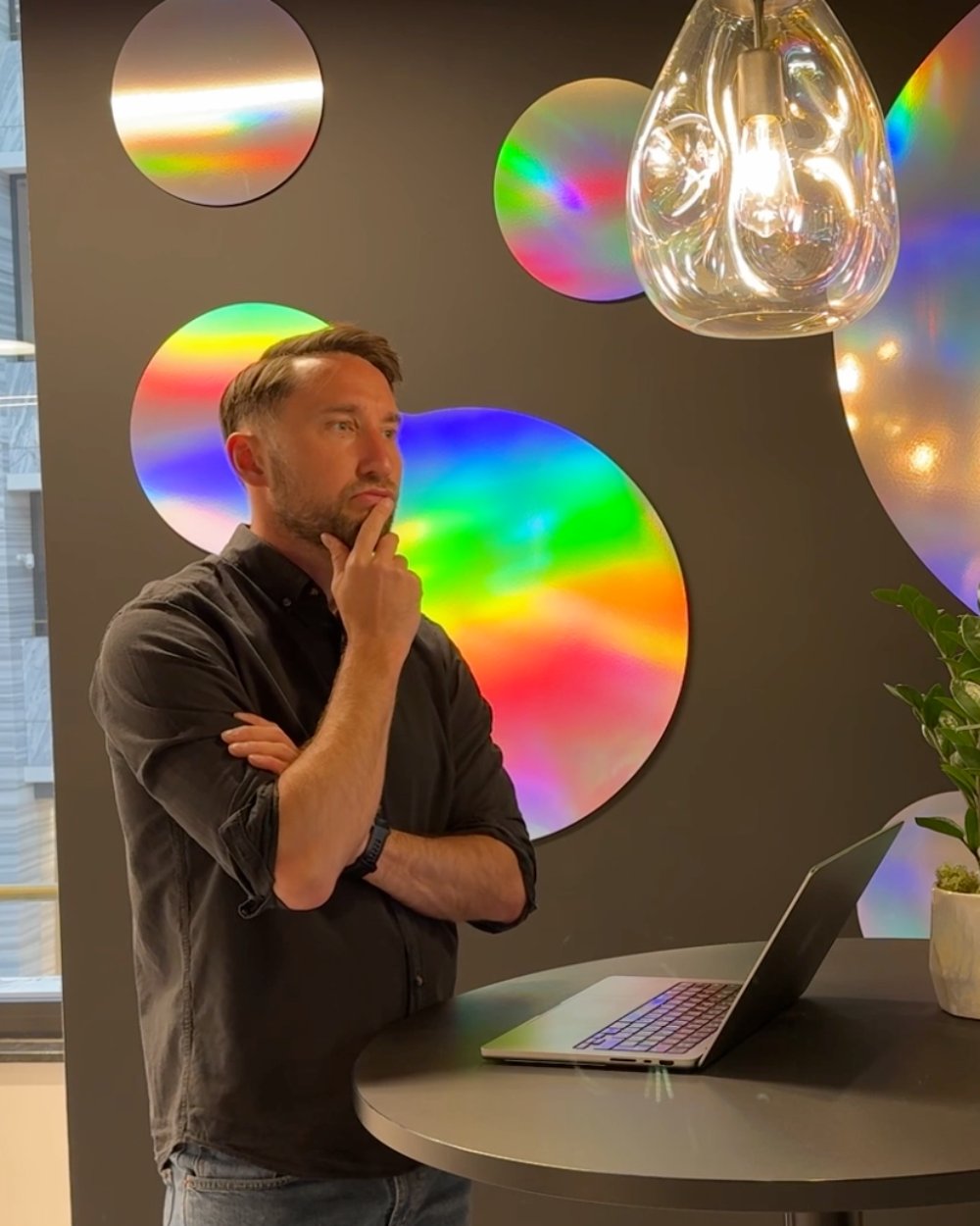 Tom Dulz thinking at a laptop